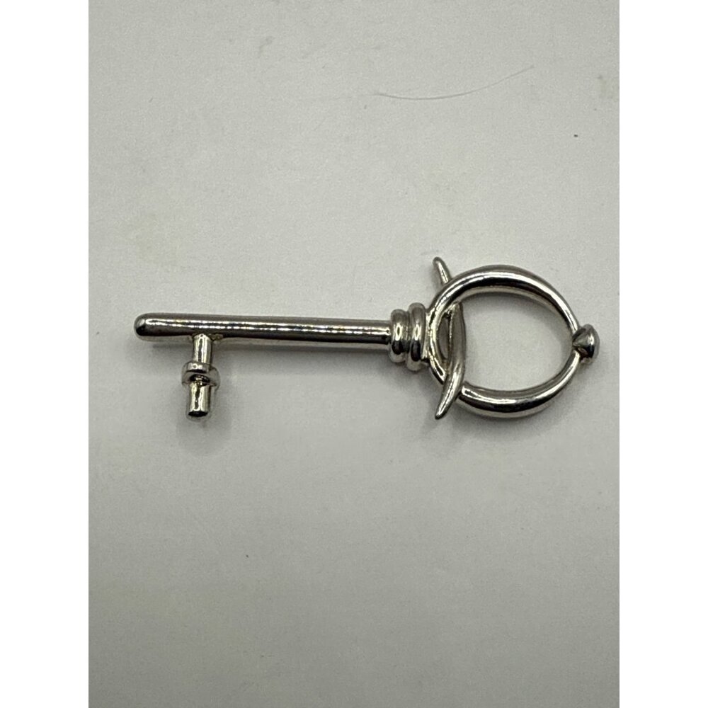 Silver Key-Shaped Pendant Charm By My Clique